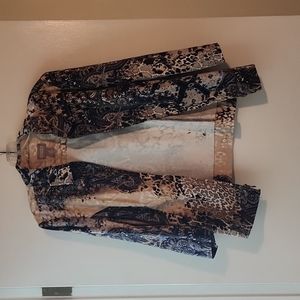 Chico jacket. Navy blue. Goes with jeans or casual pants. Size 2 or 12, 14.